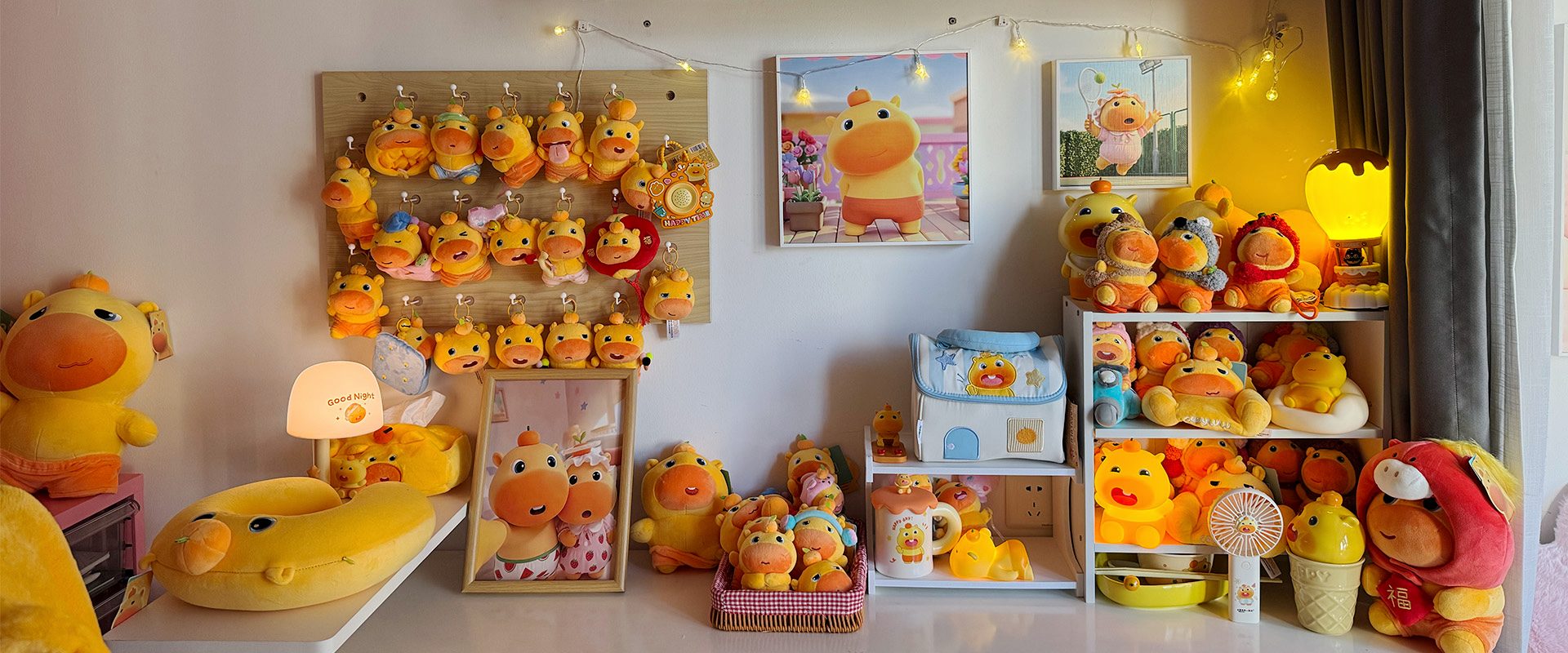 A real CapyLulumi studio display filled with Lulu and Lumi artwork and collectibles